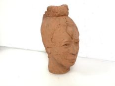 A Studio Pottery clay bust of an East Asian male head, stamp to interior and verso, CMV (29cm x 15cm