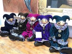 A collection of five Xenis Exquisite handpainted musical clown figures, each with individual face,