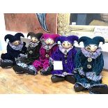 A collection of five Xenis Exquisite handpainted musical clown figures, each with individual face,