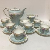 An Aynsley china Wayside pattern fifteen piece coffee set in unused condition, decorated with
