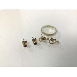 A 9ct gold ring (P) (2.29g), a pair of 9ct gold seed pearl stud earrings and another pair of