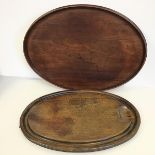 A mahogany oval tray, with raised edge (59cm x 41cm) and another (2)