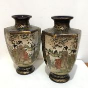 A pair of Japanese Satsuma octagonal baluster tapered vases decorated with landscape and figure