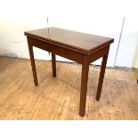 A George III mahogany foldover card table, the rectangular top above a concertina action, on