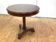 A William IV mahogany centre table, in the style of James Mein, the circular top with moulded