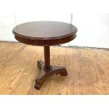A William IV mahogany centre table, in the style of James Mein, the circular top with moulded