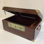 A late George III mahogany and brass-bound campaign writing box, the hinged top with unusual