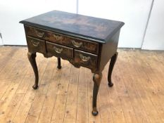 A George II style painted lowboy, the rectangular top above four variously sized drawers, raised