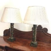 A pair of modern painted columnar toleware table lamps, each polychrome painted with insects,