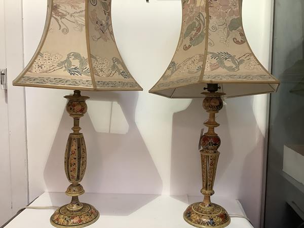 A pair of vintage painted papier mache table lamps, of pierced baluster form, polychrome decorated