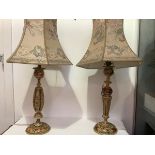 A pair of vintage painted papier mache table lamps, of pierced baluster form, polychrome decorated