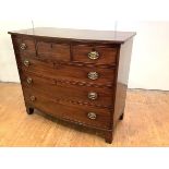A Scottish Regency mahogany bowfront chest, with three short and three long graduated drawers,