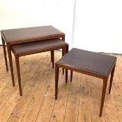 Johannes Andersen, a set of three graduated rosewood tables, early 1960's, manufactured by Silkborg,
