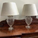 A pair of large brass-mounted glass urn-form table lamps, modern, the fluted and panel-moulded