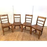 A set of four Scottish mid-19th century elm dining chairs, probably originating from Fife, each with