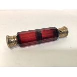 A mid-19th century silver-gilt mounted ruby glass double-ended scent flask, Sampson Mordan, London