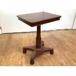 A William IV mahogany occasional table, the rectangular top and moulded frieze raised on a turned