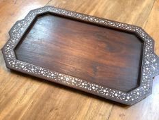 An Indian ivory-inlaid rosewood tray by Woods, Bird & Co., Jullundur City (Jalandhar, Punjab), 1945,