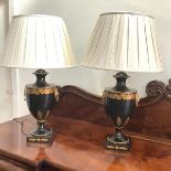 A pair of modern toleware urn-form table lamps, each with gilt acorn and oak leaf decoration, and