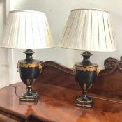 A pair of modern toleware urn-form table lamps, each with gilt acorn and oak leaf decoration, and