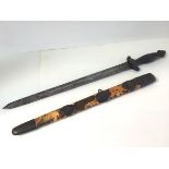A Chinese "Jian" short sword, 19th century, with fluted wooden grip above shou crosspiece, with