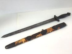 A Chinese "Jian" short sword, 19th century, with fluted wooden grip above shou crosspiece, with