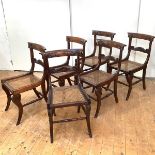 A set of six Scottish Regency stained beech chairs c.1820, each slightly curved top rail incised