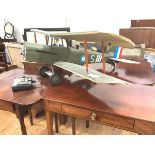 A large model SE5A bi-plane, paper over a wooden carcass, with 4 stroke engine. Length 110cm