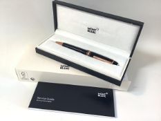 Mont Blanc: a Meisterstuck rose gold-plated LeGrand ballpoint pen, boxed with service booklet.