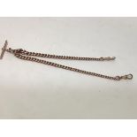 A 9ct gold Albert watch chain, of graduated curblinks, with t-bar and pair of lobster clasps. Length