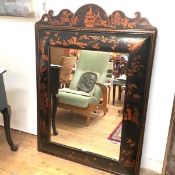 A large Chinoiserie decorated cushion-framed wall mirror in early 20th century style, the