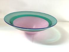 Simon Moore (British, b. 1959) a studio glass centre bowl, banded in green and pink, signed.