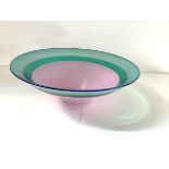 Simon Moore (British, b. 1959) a studio glass centre bowl, banded in green and pink, signed.