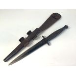 A World War II 3rd Pattern Fairbairn-Sykes 'B2' Commando fighting knife, the hilt with ribbed