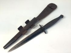 A World War II 3rd Pattern Fairbairn-Sykes 'B2' Commando fighting knife, the hilt with ribbed