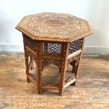 A hexagonal Indian ivory-inlaid rosewood occasional table by Woods, Bird & Co., Jullundur City (