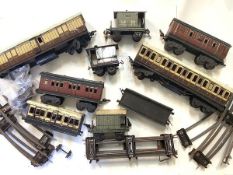 A group of German O Gauge tinplate rolling stock, early 20th century, Marklin and Gebruder Bing (