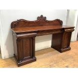 A 19th century mahogany sideboard, c. 1830, the gallery back (possibly associated), incorporating