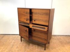 McIntosh & Co., Ltd: an early 1960's rosewood-veneered living room cabinet, fitted with four
