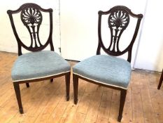 A pair of Edwardian mahogany side chairs, in the style of William and John Linnell, the shield