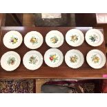 A set of ten Meissen fruit-painted dessert plates, 20th century, each decorated to the well with