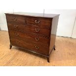 A late George III mahogany chest, c. 1800, the rectangular top above two short and three long