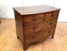 A small early 19th century mahogany bowfronted chest of drawers, with two short over two long