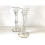 A pair of Regency cut-glass candlesticks, early 19th century, each with thumb-cut baluster candle-