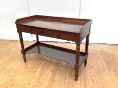 A William IV mahogany washstand, with three quarter gallery, pair of frieze drawers, raised on