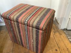 A kilim-covered box ottoman, of cube form. 51cm by 53cm by 39cm