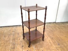 A mid-19th century mahogany Whatnot of small proportions, the three rectangular tiers surmounted