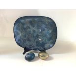 Margery Clinton (1931-2005), two lustre-glazed pottery eggs, one in mottled blue, the other gold,