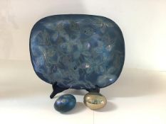 Margery Clinton (1931-2005), two lustre-glazed pottery eggs, one in mottled blue, the other gold,