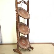 An Indian ivory inlaid rosewood three tier cakestand, probably by Woods, Bird & Co., Jullundur